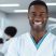 young-black-dentist-posing-for-dental-clinic-banner-with-copy-space-free-photo